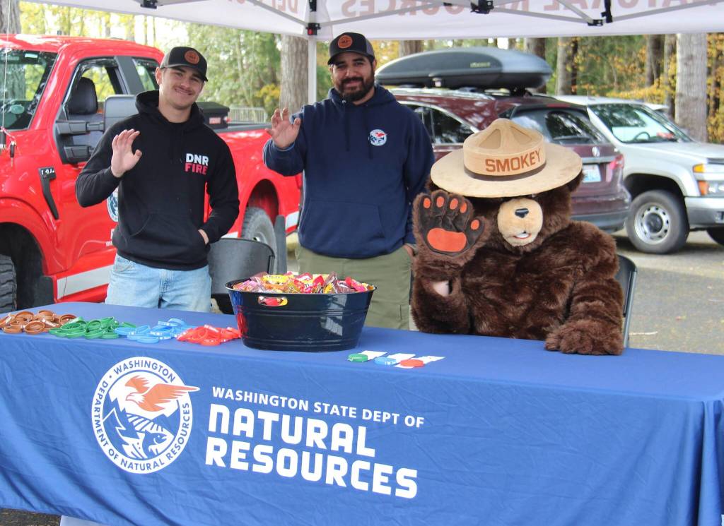 Smokey Bear and DNR staff are happy fire season is over with all the recent rain, but glad the rain held off during the event.