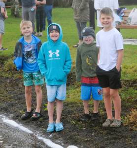 Photo by Lonnie Archibald
All smiles before …Several youngsters were amongst those who took to the waters at Lake Pleasant Clallam County Park on New Years morning. Pictured here are just a few of those who were ready to take the plunge braving the cool waters.