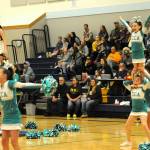CCA performs some stunts at halftime in the Spartan Gym.