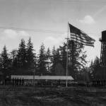 Dobyns collection
The Naval Auxiliary Air Station (NAAS) Quillayute was dedicated in 1944. The station was used as a training center and coastal patrol station during World War II. Photo of the dedication day.