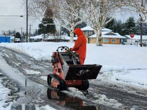 Submitted photo
City of Forks Public Works crew members kept sidewalks clear using some new equipment.