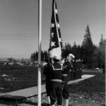 Navy personnel raise the flag at the not-so-secret commissioning ceremony in February 1944. photos Dobbins collection