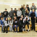 Forks wrestlers pose for photos before departing to Tacoma last Thursday for the 2B state championships. Photo by Lonnie Archibald