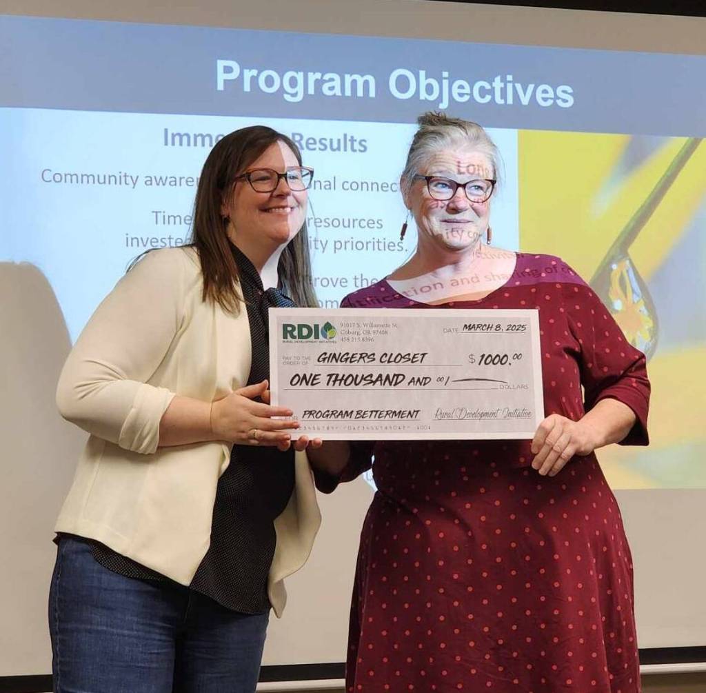 Submitted photos
Christine Gilmore, Director of Leadership and Community Engagement RDI, with Patsy Brown accepting a $1000 grant for Gingers Closet.