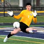Photos by Lonnie Archibald
Spartan goalkeeper Juan Terrones doing his part in protecting the goal against the Roughriders.