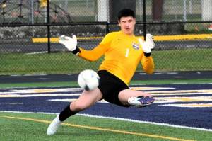 Photos by Lonnie Archibald
Spartan goalkeeper Juan Terrones doing his part in protecting the goal against the Roughriders.