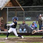 Photo by Lonnie Archibald
Forks Bailey Johnson with a base hit against Ilwaco. Johnson hit two home runs in the first game going 2 for 4 and 3 for 4 hits in the second game with one being a triple.