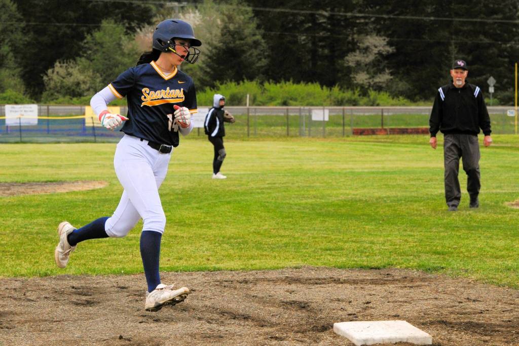 Photo by Lonnie Archibald
Spartan Chloe Gaydeski rounds third after hitting the ball over the fence for a home run in the second game of the double header. Gaydeski went 2 for 4 hits in the first game and 3 for 3 in the second.