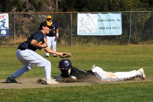 Photo by Lonnie Archibald
The Sequim runner steals second as Spartan second baseman Mason Dent makes the tag. 2A Sequim defeated the Spartans 15 to 9 in this non-league contest.