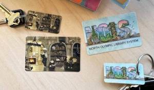 Submitted photo
NOLS has new library cards featuring a digital illustration by Lance Snider (left) and a watercolor and ink landscape by Sarah Necco (right).