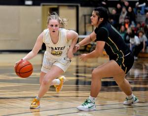 Peninsula Pirates Athletic Department
Pirate guard Kadie Wood handling the ball in a game against Shoreline. Wood scored 10 points.