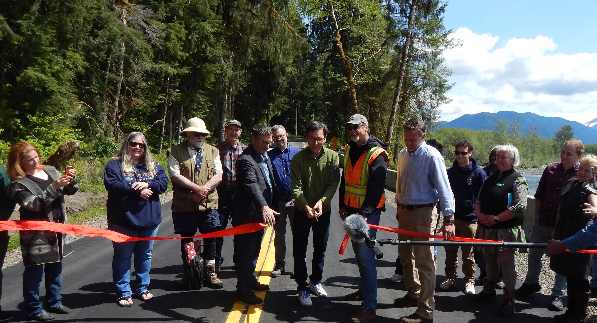 And the ribbon is cut, Thursday, May 8, by Governor Bob Ferguson, offcially re-opening the Upper Hoh Road and access to the Hoh Rain Forest. Photo Christi Baron