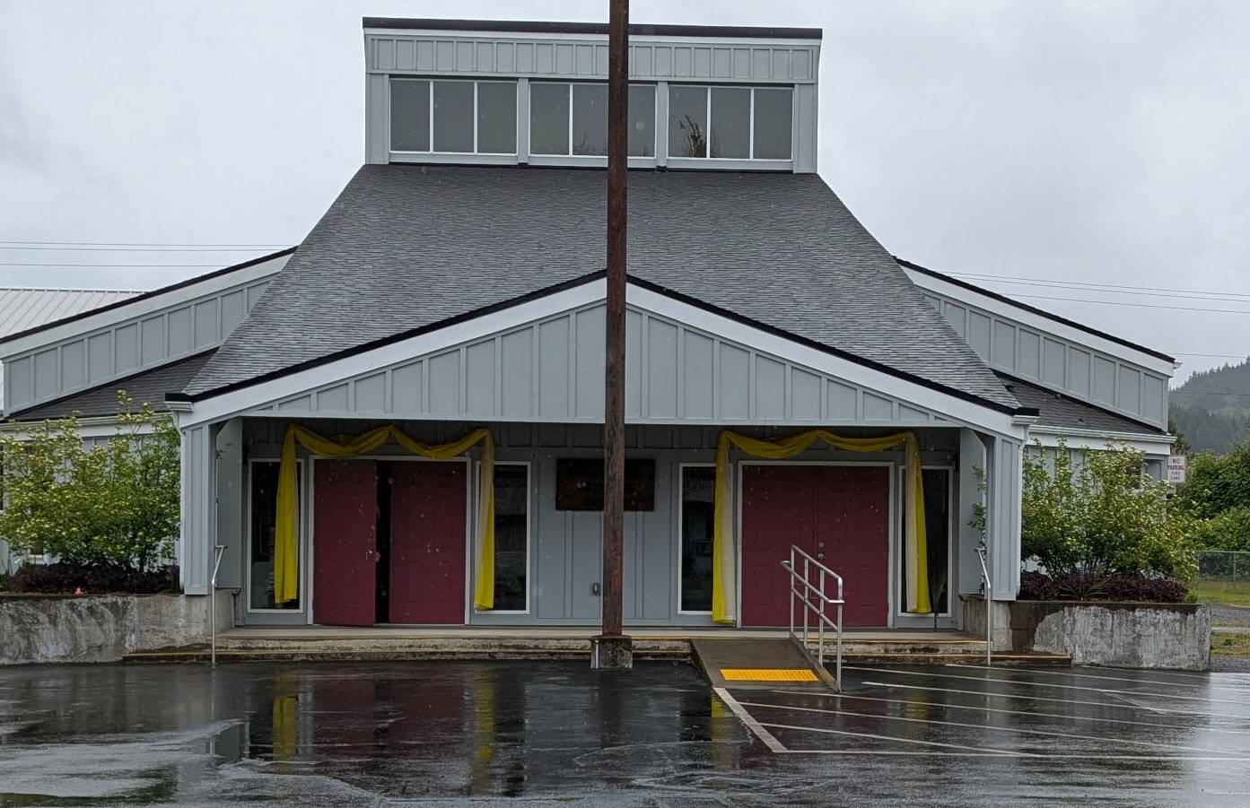 Yellow bunting adorns the entrances of St. Anne Catholic Church, 511 5th Avenue, bringing brightness to a rainy day and symbolizing the joyful beginning of a new papacy. As a sign of celebration and hope, it marks the leadership of Pope Leo XIV and a renewed spirit for the future. Submitted photo
