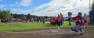 Top, Cameron Campbell throws the first pitch to Liam Coburn at the annual Kenny Church Memorial Tournament held May 31 and June 1. Saturday was a little chilly, but Sunday saw some sun. 
Middle, the As came out on top in the boys teams.
Bottom, the Bandits were victorious for the girls teams.
Submitted photos