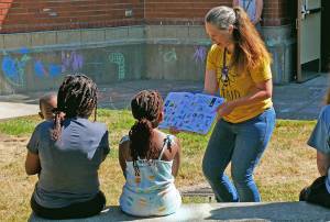 Storytime returns to all NOLS branches in July. Port Angeles Main Library hosts the event outside in the courtyard. NOLS photo