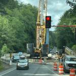 A huge crane was used for the huge girder placement at the May Creek fish passage project last week. Travelers south were warned of possible 30-minute delays. 
Photo
 John Hillcar