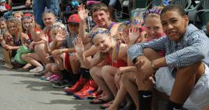 Photo by Lonnie Archibald
Children gathered along Forks Avenue to take in the 4th of July parade in 2014.