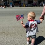 Warning: May cause extreme levels of patriotic awww! It was the first 4th of July for this little parade watcher. 
Photo Glenda Klahn
