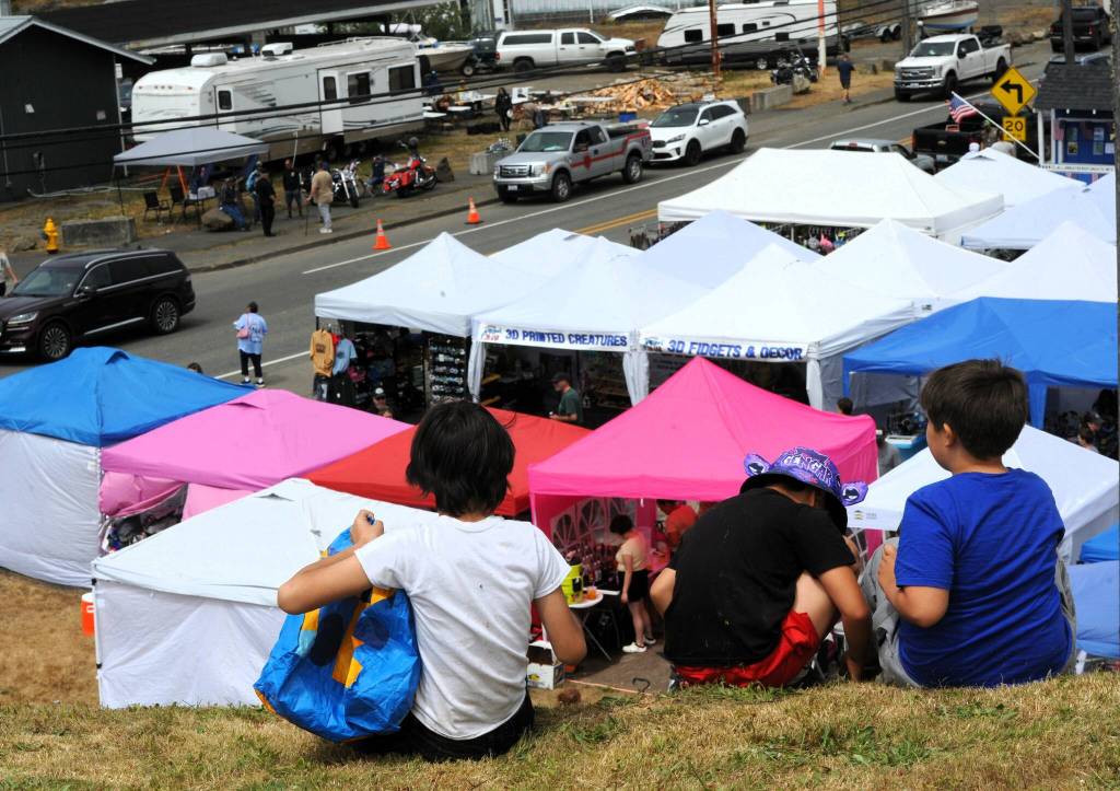 These children had great weather and a good view of the street fair below.