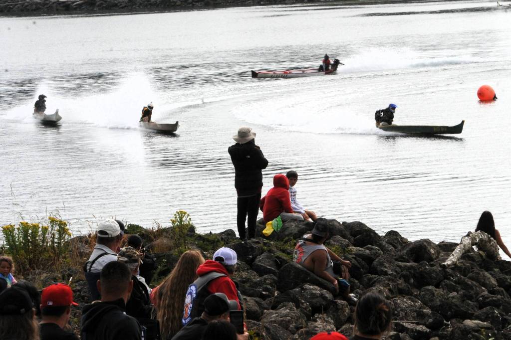 There were rooster tails along the Quillayute Saturday as these dug-out canoes with 30 hp motors completed the south turn during Quileute days.