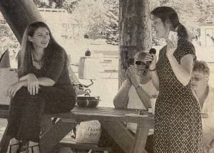 Photo Carole Rose
Osborne on the right holds a Forks Library card for Stephenie Meyer in 2006 at Tillicum Park.