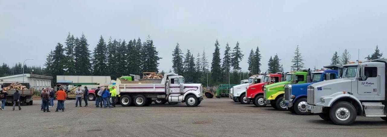 Photo Forks Lions
Local dump trucks were lined up and ready to deliver firewood.