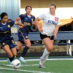 Photo by Lonnie Archibald
Spartan Kim Camacho controls the ball against East Jefferson (a combination of Port Townsend and Chimacum players) Monday, Sept. 29, at Spartan Stadium, where Forks defeated the Rivals 7 to 0. Also in the action is Forks Jade Blair.