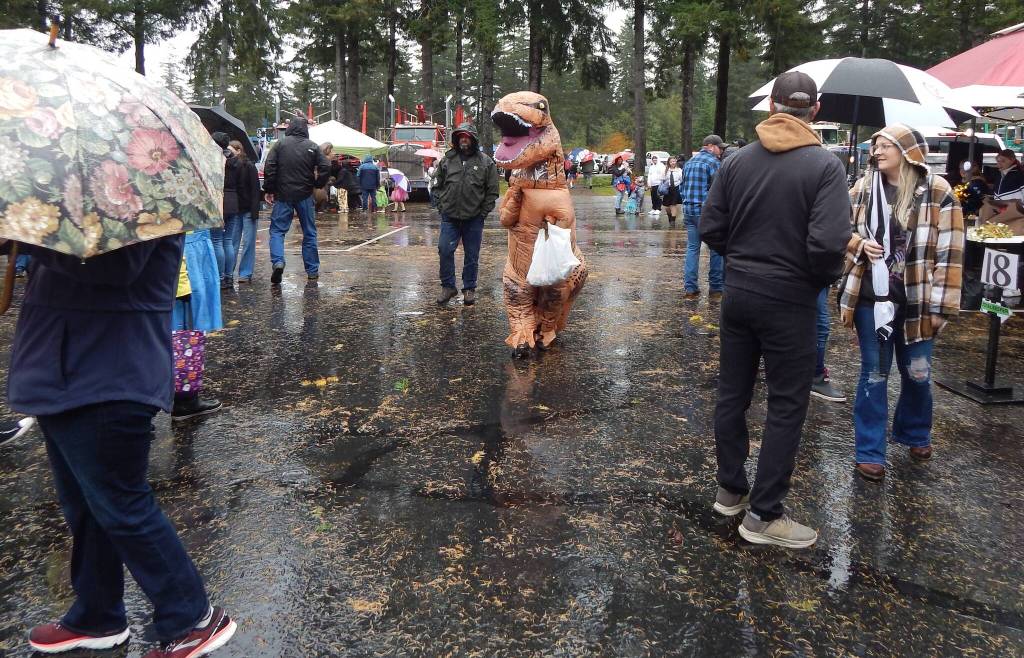 Another dinosaur sighting, along with lots of umbrellas.