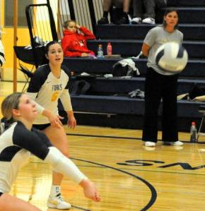 Photos Lonnie Archibald
Coach Jenn LeDuke looks on while Bailey Johnson and Chloe Gayeski make a play.