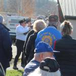 Right, Forks American Legion Post #106, welcomed a large crowd on a sunny day to the annual Veterans Day Ceremony at the Gold Star Families Memorial Monument. Saying a few words were Forks Mayor Tim Fletcher and City of Forks Attorney/Planner Rod Fleck. Those attending the Veterans Day Ceremony look on as the American Legion rifle squad offered the gun salute.