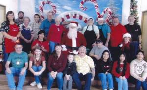 Over 260 hungry Santa Fans turned out for the annual Breakfast with Santa at the Congregational Church on Saturday. Helping make the event happen were volunteers from West Business and Professional Association, Quiet Conversations Home School, Forks High School FCCLA, volunteers from the community, the Congregational Church family, and of course Santa Clause. Pictured here are some of the volunteers. Photo WEBPA