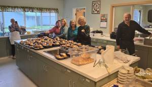 Submitted photo
Feeding 5000 volunteers served turkey and all the trimmings during their most recent Free lunch last Tuesday at the Community Center. Here you see 45 ready-to-eat meals packed up for those in need. Many thanks to the dedicated volunteers who make this effort possible every week, and Merry Christmas from Eugene, Don, Sherry, Debbie, Pat, Cathy, Chrissy, Theresa, Saydee, and Charles.