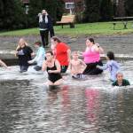 And seventeen take the plunge into the cool waters at the Lake Pleasant County Park on this cool start of the new year. Photo by Lonnie Archibald