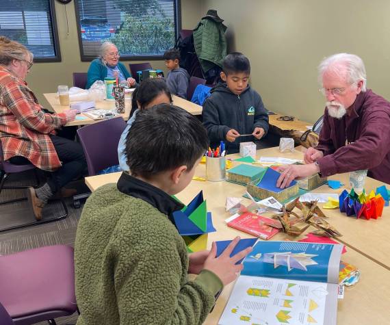 <p>Rainforest Council for the Arts took over the Forks Library on Saturday and local artsists and crafters offered up a variety of things they worked on in the month of January. In addition to the display out front, and fresh off their crane-making fun, the Hunters were set up in the Klahn room at the Library on Saturday helping kids and some adults do some fun crafts. </p>
                                <p>Photos Christi Baron</p>