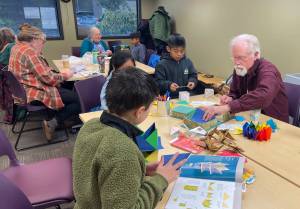 Rainforest Council for the Arts took over the Forks Library on Saturday and local artsists and crafters offered up a variety of things they worked on in the month of January. In addition to the display out front, and fresh off their crane-making fun, the Hunters were set up in the Klahn room at the Library on Saturday helping kids and some adults do some fun crafts. 
Photos Christi Baron