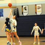 Photo by Lonnie Archibald
Forks 8th grader Chaz Fryberg tips it to the Spartans as Forks took on Crescent in the Forks Gym, where Crescent defeated Forks 19 to 9 in this non-league contest. Also in the action are Orryanna Gonzalez (33) and Sofia Huling (52).