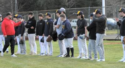 Spartan head coach Ken Olson goes over procedures with this seasons Forks baseball team at the Fred Orr Memorial Park in Beaver. Forks was scheduled to open the season at Quilcene on Wednesday, March 11, beginning at 4 pm. 
Photo by Lonnie Archibald