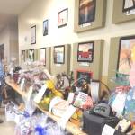 Photo Christi Baron 
The generosity of the community is always amazing to see …you name it …it probably came up for bid. Here themed baskets and other items line the tables.