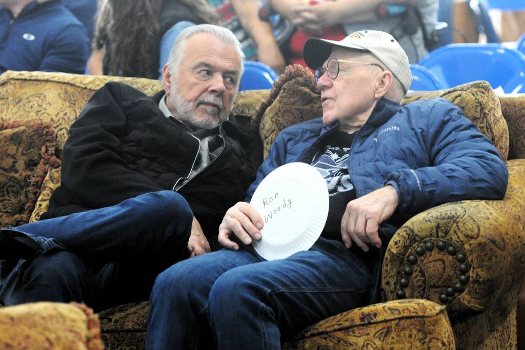 It was all the comforts of home for Don Grafstrom (left) and Ron Woody as they awaited the bidding war here at the commons. It was great to see many former Forks residents like Ron coming back to support the auction. Photo Lonnie Archibald