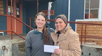 Submitted photo
Stefani Dowling, left, representing Gingers Closet, presents Jumpstart Preschool owner Terra House with a donation to benefit a new scholarship.