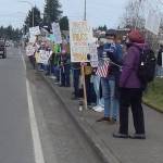 About 100 people gathered at the Forks Transit Center on Saturday, March 28, for a No Kings Protest. Organized locally, it was part of a series of demonstrations across the US to protest the actions and policies of the second Trump administration and other related current issues.