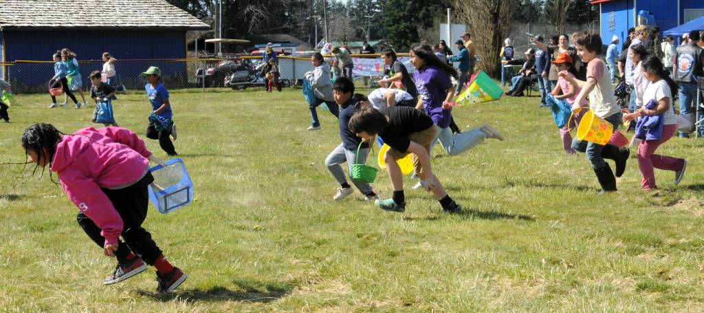 The 9 to 12-year-old group scrambled for the eggs at the sound of the starting signal.