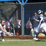 Spartan first baseman Avery Dilley makes the play at first for the out.
