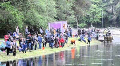 Shown here is just a quarter of those fishing during the Kids Fishing Day. Pictured in the back is the Forks Elks Clubs food trailer where hot dogs, hot chocolate and donuts were served to those hungry fishermen who ventured here. 
Photos by Lonnie Archibald