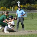 Forks Chloe Gaydeski stole second against the Roughriders, well ahead of the throw. 
Photos by Lonnie Archibald