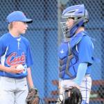 Cubs pitcher Drew Johnson and catcher Owen McReynolds meet on the mound to discuss a possible mix-up on their signals. If the catcher calls for a fastball and the pitcher throws a big roundhouse curve, it can be hard to catch. But then again, maybe they were discussing one of the girls sitting in the rooting section. Whatever the discussion was, the game played on. I wasnt able to attend the entire game, but a fan told me McReynolds later pitched, earning three straight strikeouts.