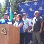 Recognized as the Olympic Corrections Centers Team of the Year, the Maintenance Team includes, from left, Zack Warner, Chris Lukens, Harley Davidson, Matt Davis, and Mike Henry. Joining them in the photo are Jamie Kerschner, far left, Superintendent Ginger Price at the podium, and Captain Marc Thomas, far right.