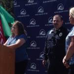 Photos Christi Baron
Olympic Corrections Center Superintendent Ginger Price reads the announcement honoring Jamie Kerschner, far right, as OCC Supervisor of the Year during the facilitys annual Corrections Appreciation Day celebration last Thursday. Looking on is OCC Captain Marc Thomas.