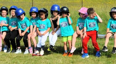 Photos by Lonnie Archibald 
This is not your normal say cheese team photo, you understand. Personalities vary, as is seen here with this Marinier T- Ball team, which includes 5 and 6-year-old ball players.