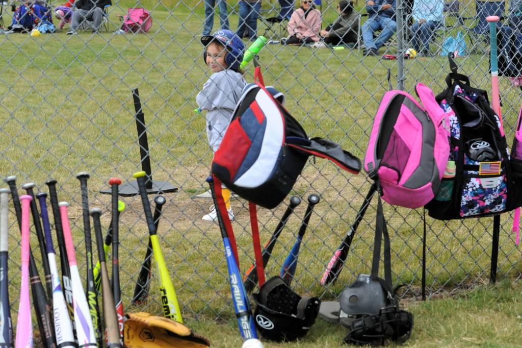 Photos by Lonnie Archibald
Rocket Preslee Sanford chose a green bat out of all those colorful war clubs that were available on this sunny day here at the diamond. Here at Duncan Fields.